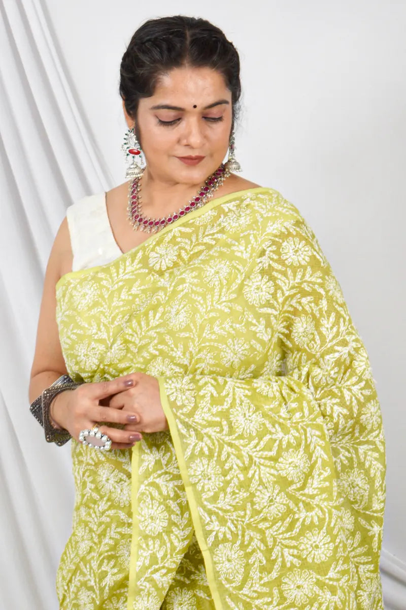 Handcrafted Green Kota Cotton Designer saree with intricate Lucknowi Chikankari Embroidery and a matching blouse, ideal for festive and wedding occasions.
