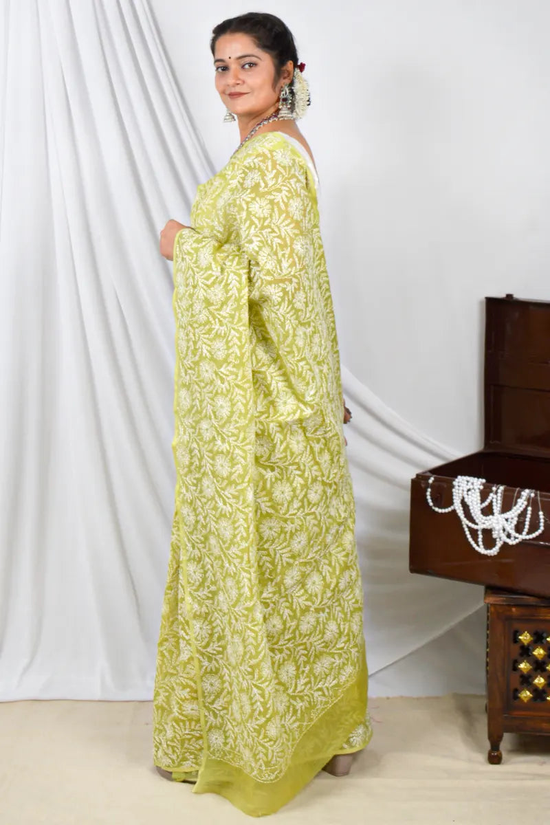 Handcrafted Green Kota Cotton Designer saree with intricate Lucknowi Chikankari Embroidery and a matching blouse, ideal for festive and wedding occasions.