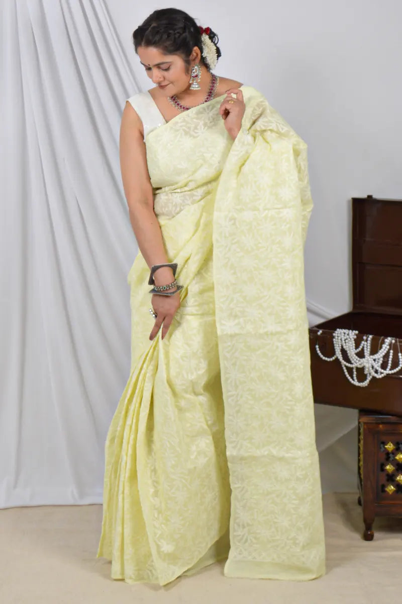Handcrafted Lemon Cotton saree with intricate Lucknowi Chikankari embroidery and a matching blouse, ideal for festive and wedding 