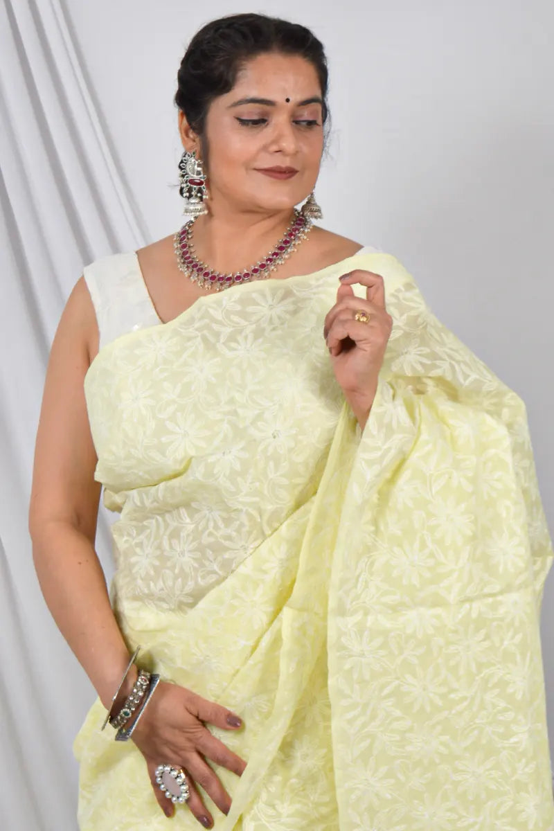 Handcrafted Lemon Cotton saree with intricate Lucknowi Chikankari embroidery and a matching blouse, ideal for festive and wedding 