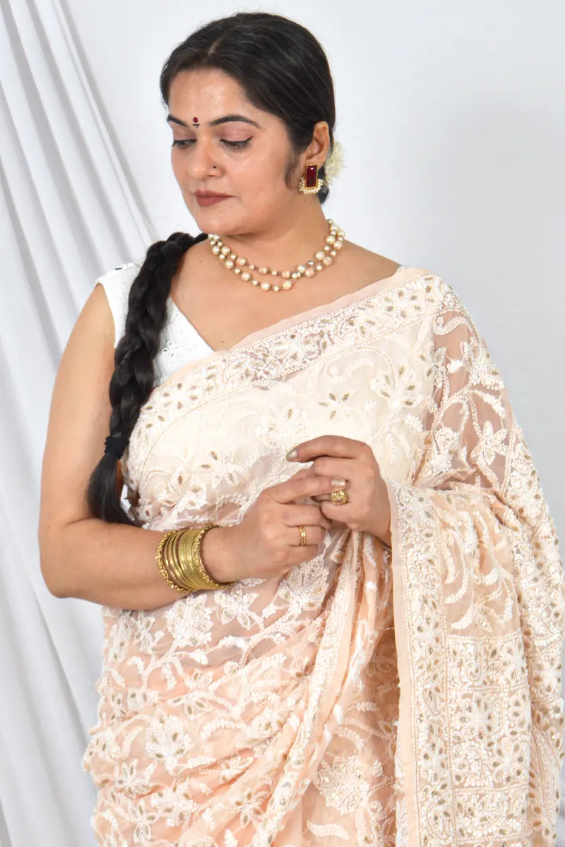 Handcrafted Georgette Saree with GotaPatti intricate Lucknowi Chikankari Embroidery and a matching Blouse, ideal for Festive and  occasions.