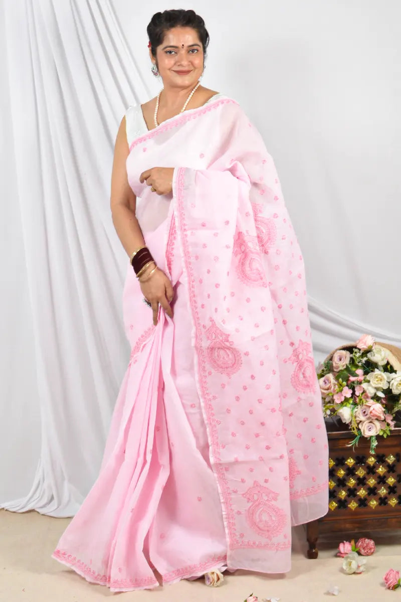 Handcrafted Baby Pink Designer Cotton saree with intricate Lucknowi Chikankari embroidery and a matching blouse, ideal for festive and wedding .