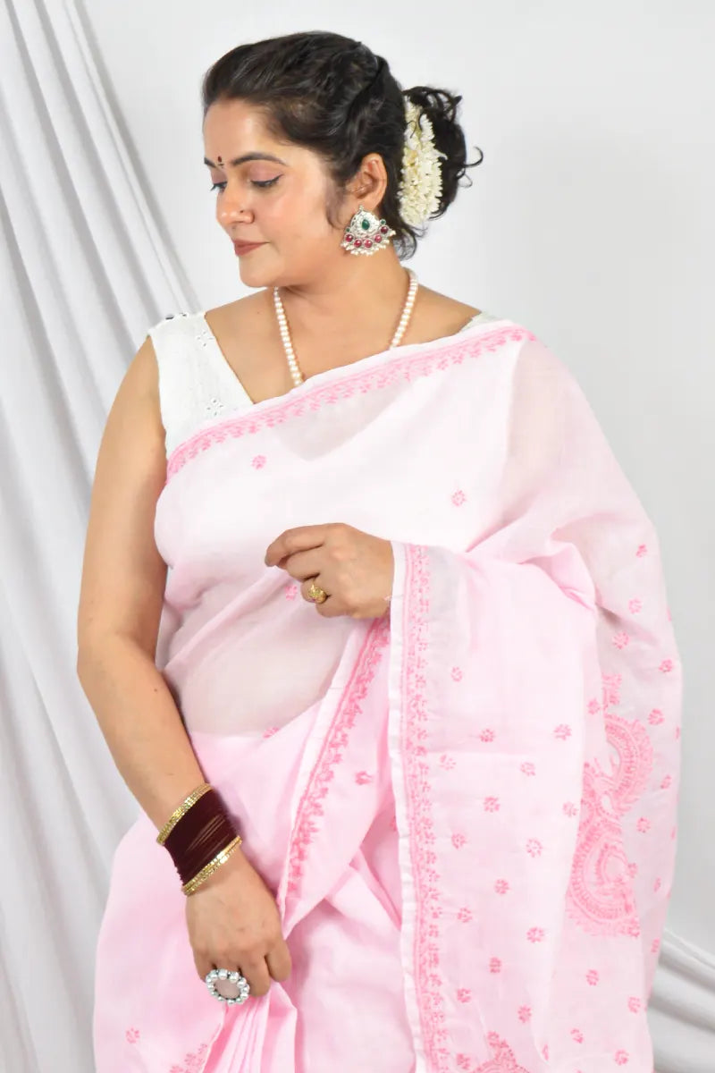 Handcrafted Baby Pink Designer Cotton saree with intricate Lucknowi Chikankari embroidery and a matching blouse, ideal for festive and wedding .