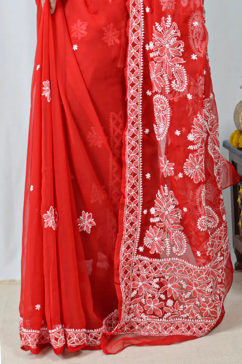 Red georgette saree with intricate Lucknowi Chikankari embroidery and matching blouse – handcrafted festive wear by MeMaana.