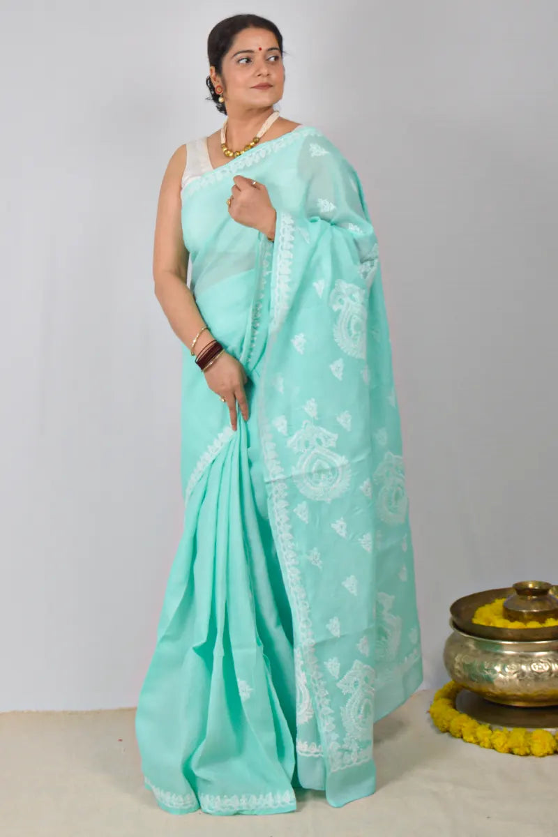 Sea Green cotton saree with hand-embroidered Lucknowi Chikankari and matching blouse – handcrafted ethnic wear by MeMaana.


