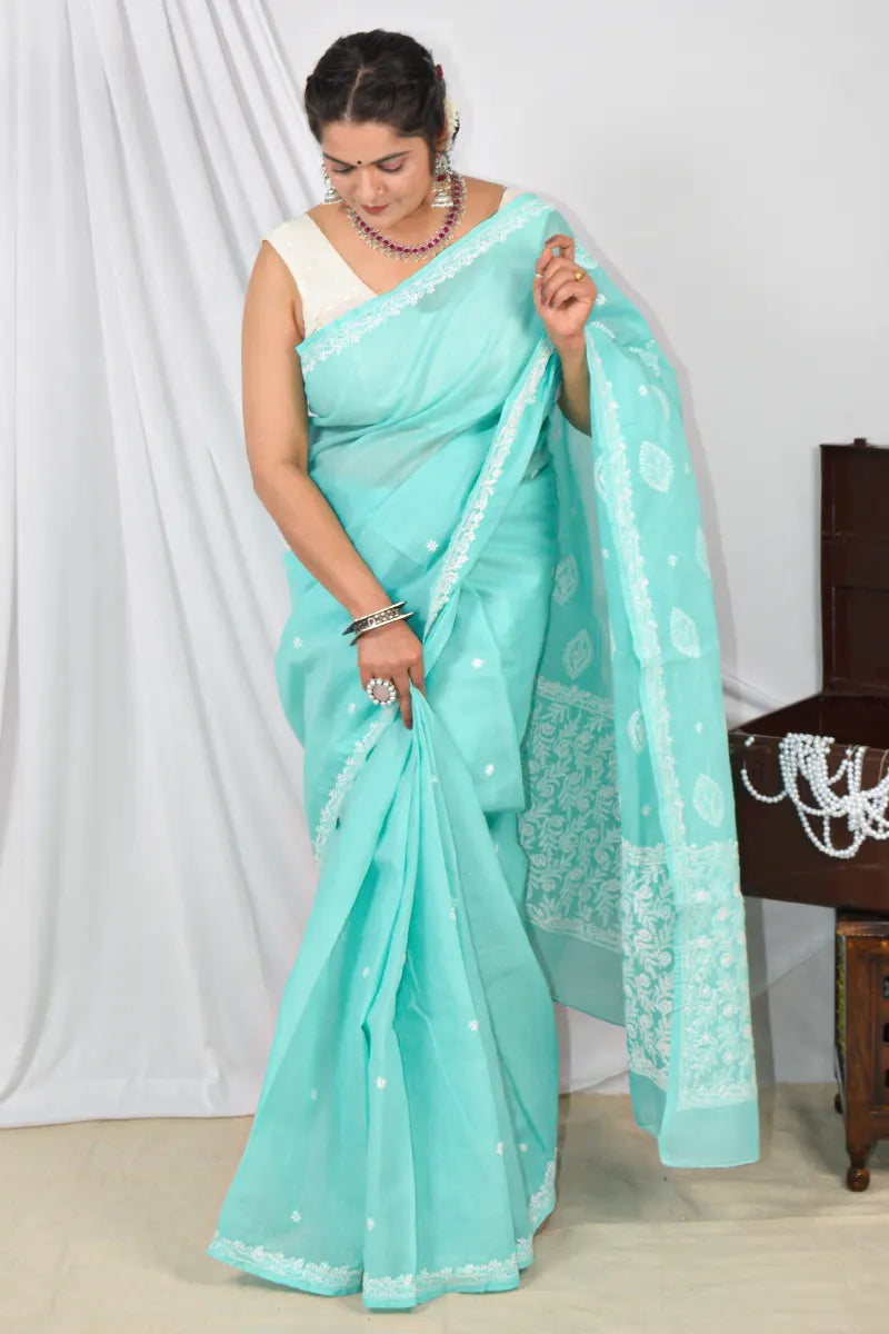 Handcrafted Sea Green Designer Cotton saree with intricate Lucknowi Chikankari embroidery and a matching blouse, ideal for festive and wedding .
