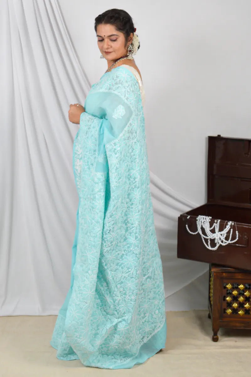 Handcrafted Sky Blue Border Palla Cotton saree with intricate Lucknowi Chikankari embroidery and a matching blouse, ideal for festive and wedding .
