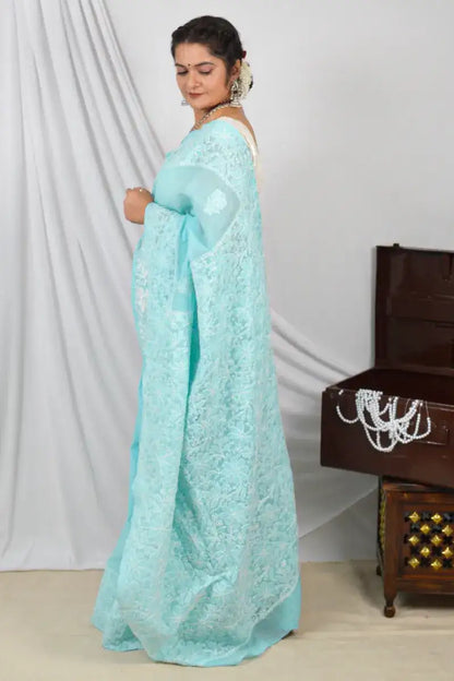 Handcrafted Sky Blue Border Palla Cotton saree with intricate Lucknowi Chikankari embroidery and a matching blouse, ideal for festive and wedding .