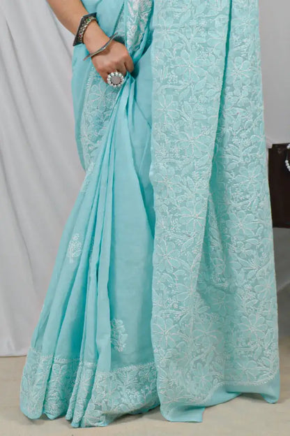 Handcrafted Sky Blue Border Palla Cotton saree with intricate Lucknowi Chikankari embroidery and a matching blouse, ideal for festive and wedding .