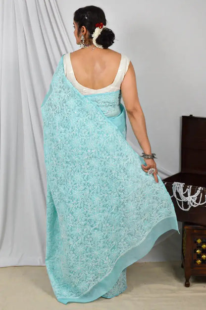 Handcrafted Sky Blue Border Palla Cotton saree with intricate Lucknowi Chikankari embroidery and a matching blouse, ideal for festive and wedding .