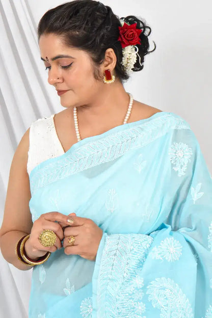 Handcrafted Sky Blue Cotton Saree with intricate Lucknowi Chikankari Embroidery and a matching Blouse, ideal for Festive and  occasions.