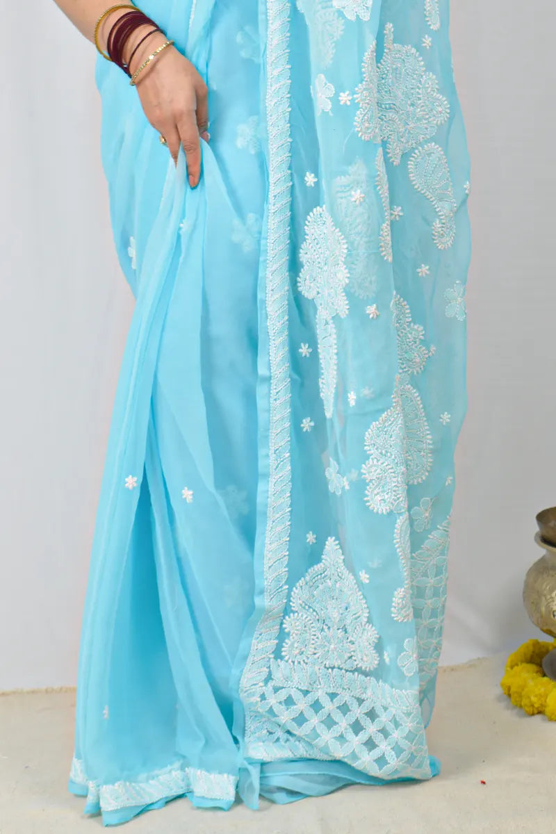 Sky blue Georgette saree with hand-embroidered Lucknowi Chikankari and matching blouse – MeMaana handcrafted ethnic wear.