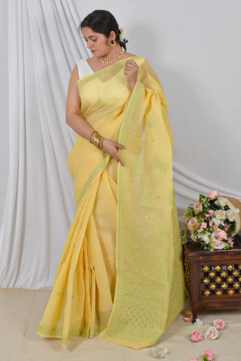 Handcrafted Yellow Cotton Saree with intricate Lucknowi Chikankari embroidery and a matching Blouse, ideal for Festive and  occasions.