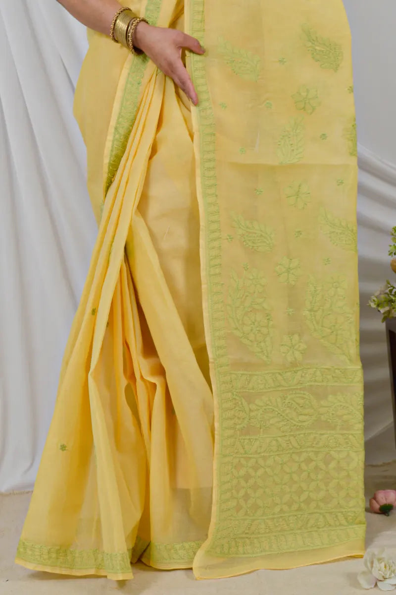 Handcrafted Yellow Cotton Saree with intricate Lucknowi Chikankari embroidery and a matching Blouse, ideal for Festive and  occasions.