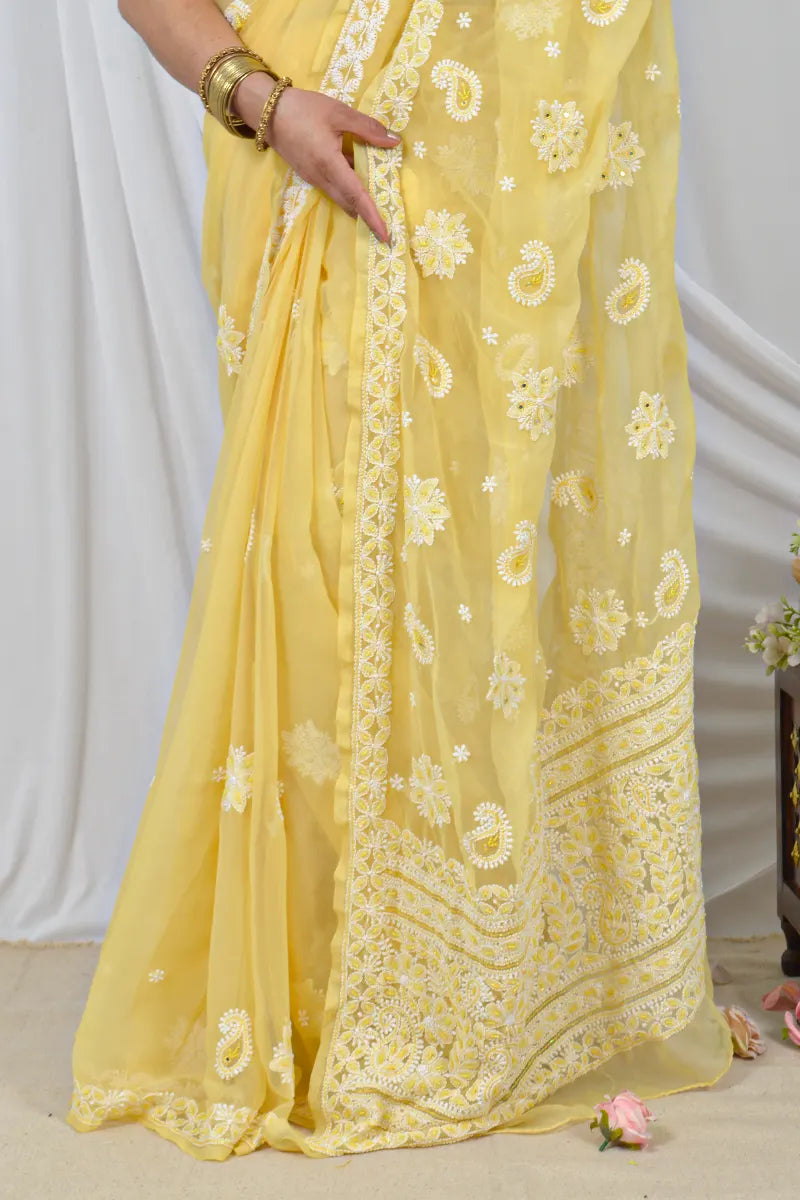 Handcrafted Yellow Georgette Saree with intricate Lucknowi Chikankari Embroidery and a matching Blouse, ideal for Festive and  occasions.