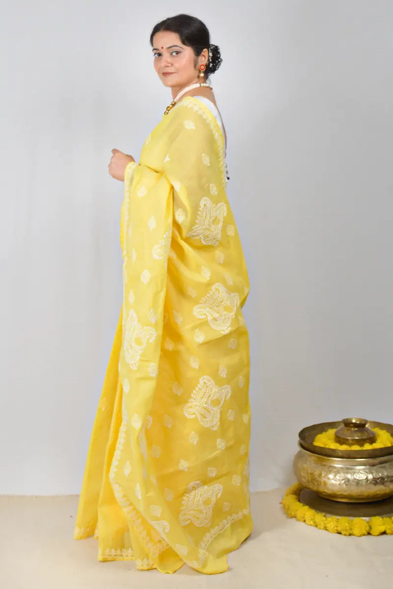 Yellow cotton saree with hand-embroidered Lucknowi Chikankari and matching blouse – MeMaana handcrafted ethnic wear.