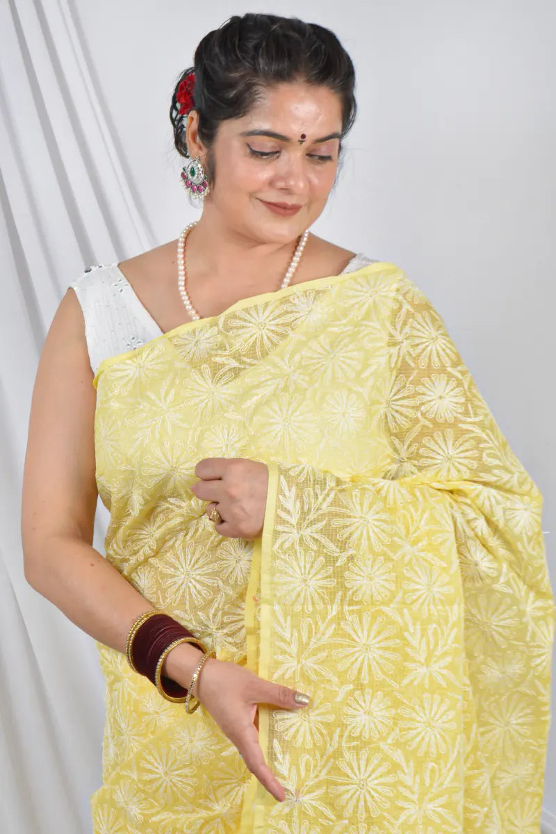 Handcrafted Yellow Allover Kota Cotton saree with intricate Lucknowi Chikankari embroidery and a matching blouse, ideal for festive and wedding .