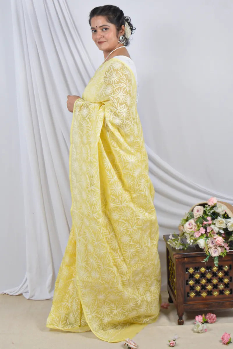 Handcrafted Yellow Allover Kota Cotton saree with intricate Lucknowi Chikankari embroidery and a matching blouse, ideal for festive and wedding .