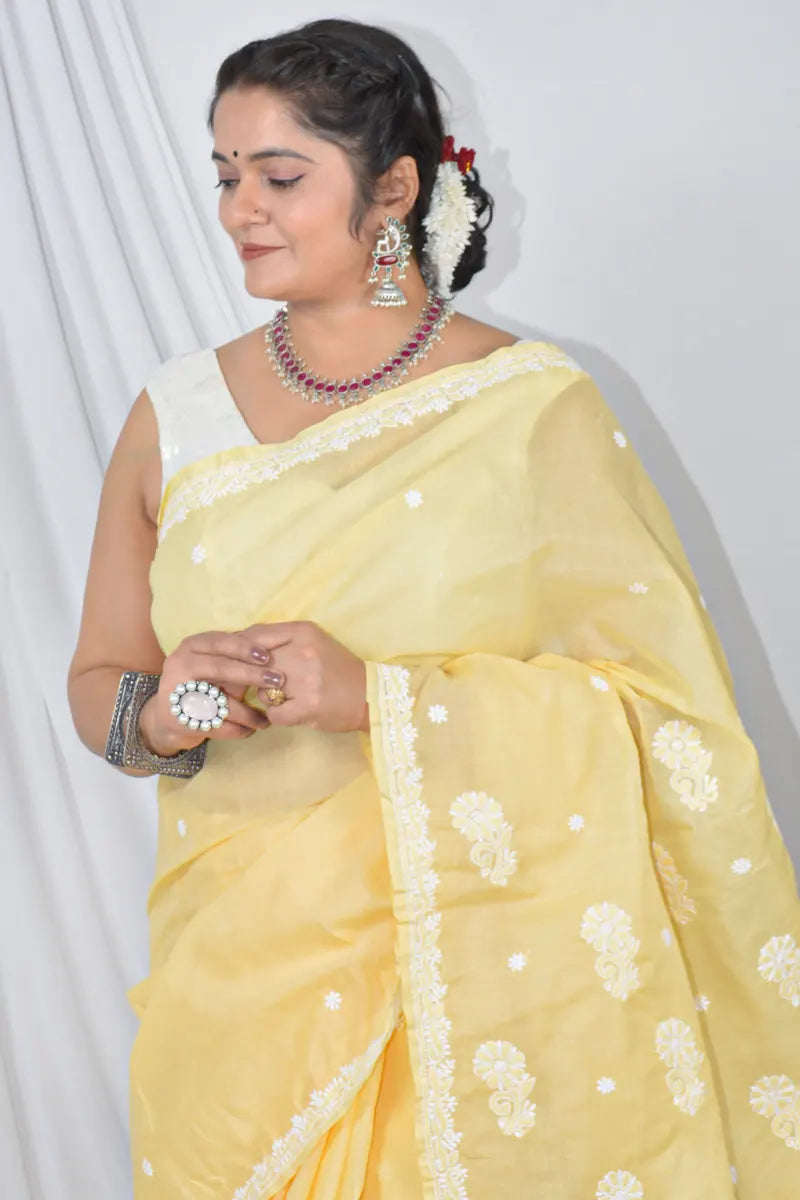 Handcrafted Yellow Designer Cotton saree with intricate Lucknowi Chikankari embroidery and a matching blouse, ideal for festive and wedding .