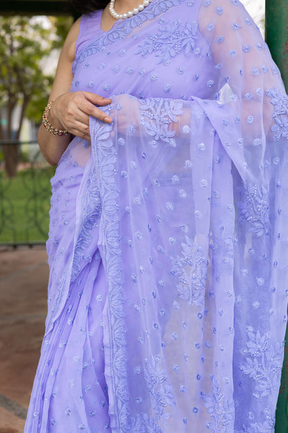 Allover Lucknowi chikankari floral embroidery pattern on lavender georgette saree pallu