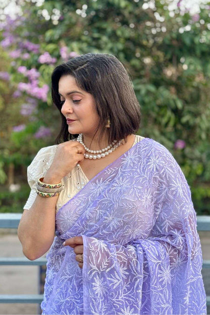 Elegant pastel saree styling with pearl jewelry look