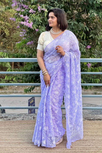 Elegant pastel saree styling with pearl jewelry look