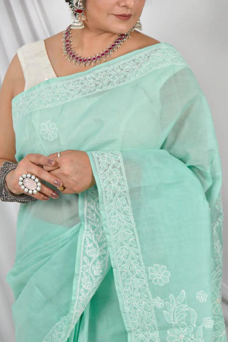 Handcrafted Green Cotton Designer Saree with intricate Lucknowi Chikankari Embroidery ,With a Matching Blouse ideal for Festive and wedding occasions