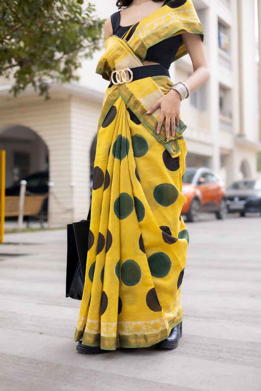 Lightweight yellow Maheshwari silk saree with polka dots and matching blouse