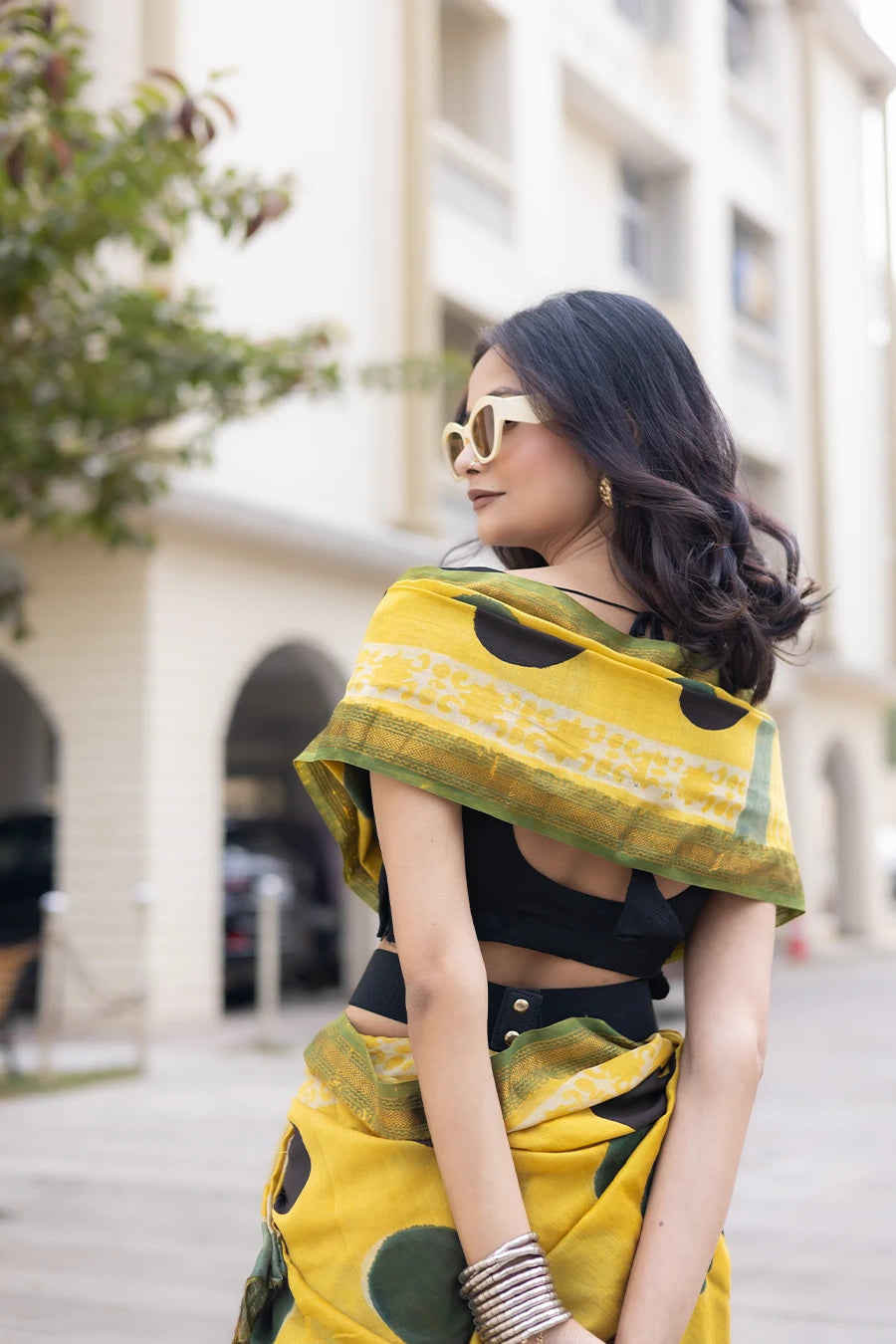 Lightweight yellow Maheshwari silk saree with polka dots and matching blouse