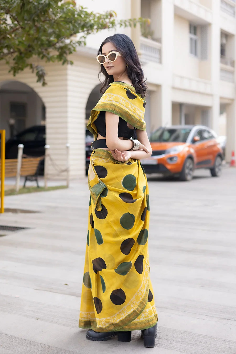 Lightweight yellow Maheshwari silk saree with polka dots and matching blouse
