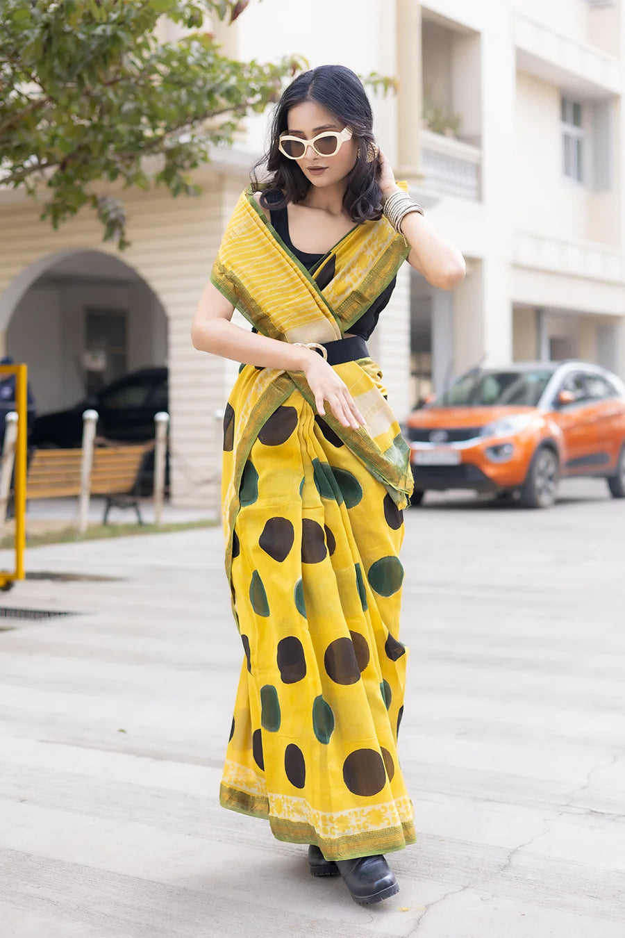 Lightweight yellow Maheshwari silk saree with polka dots and matching blouse