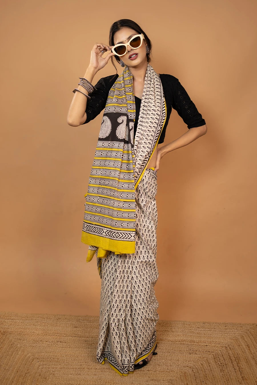 The Pranaya Edit black yellow hand block printed mulmul cotton saree