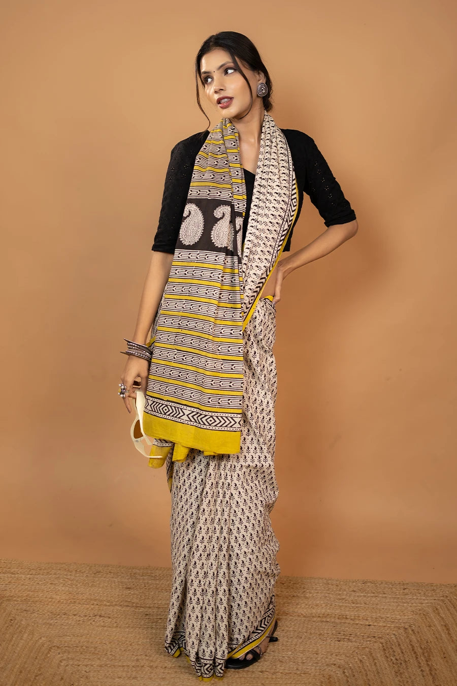 The Pranaya Edit black yellow hand block printed mulmul cotton saree