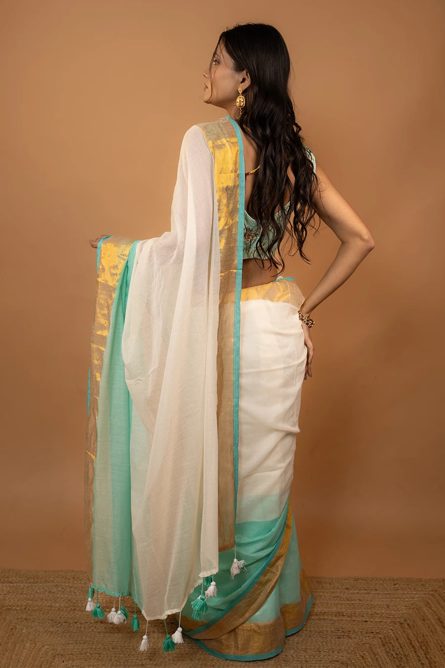 Zari Edit cream pure mul cotton saree with zari border